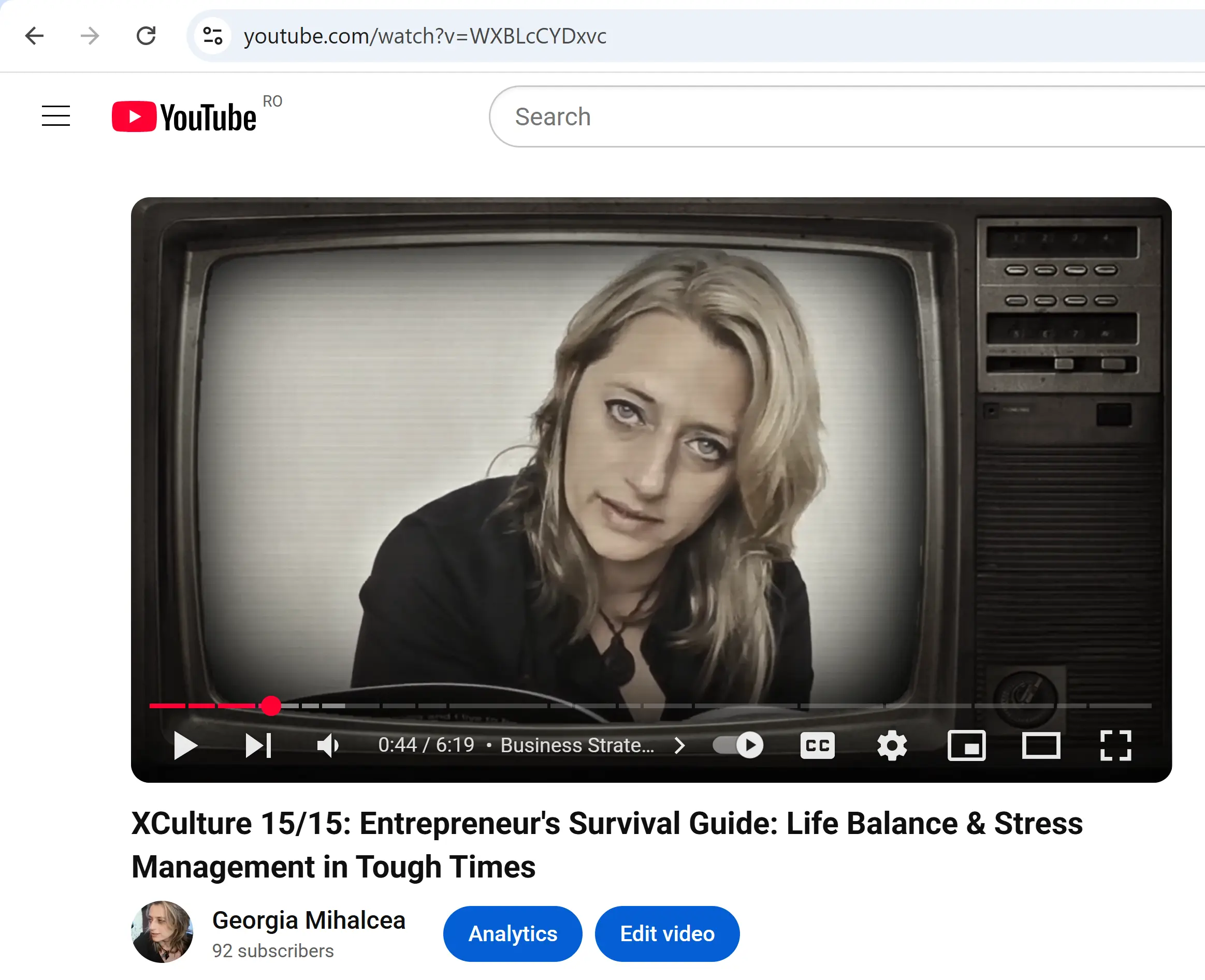 Screenshot of an XCulture video lecture showing Georgia Mihalcea on an old-fashioned TV screen, representing timeless content with a vintage production style.